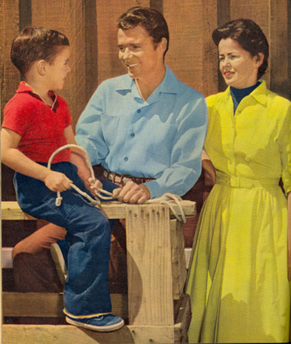Audie Murphy at home with his son four year old Terry and wife Pamela.