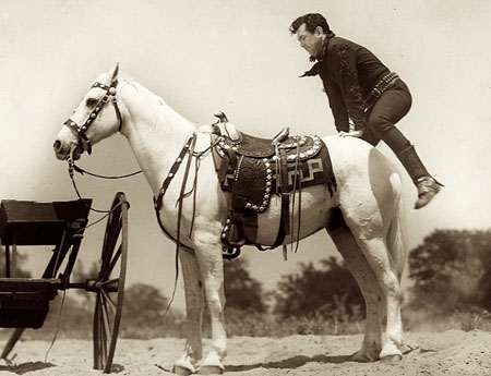 Johnny Mack Brown performing a running crouper mount. (Thanx to Jerry Whittington.)
