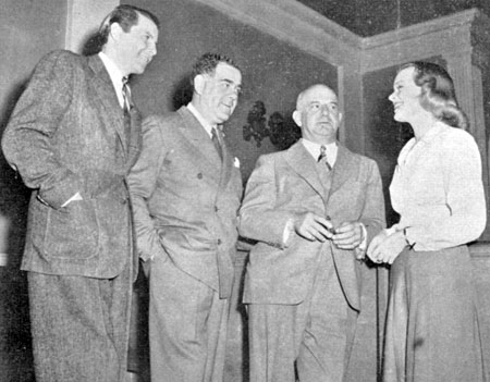 James Ellison, Republic President Moe Siegel, Herbert J. Yates, Republic Chairman of the Board and Virginia Gilmore on the set of “Mr. District Attorney in the Carter Case” (‘41).