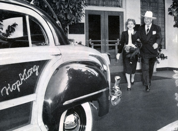 Grace Bradley and Bill Boyd head for the Hopalong station wagon in 1947.