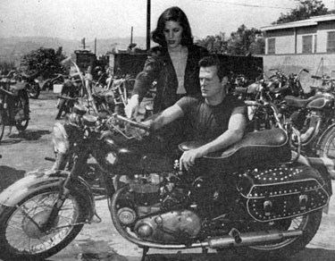 Robert Culp, star of TV’s “Trackdown”, and wife Nancy, whom Bob courted on this motorcycle.