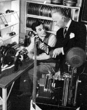 Hopalong Cassidy (William Boyd) consults with film editor Fred Berger in 1947.