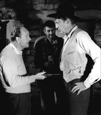 Director Anthony Mann discusses the next scene for “Man of the West” (‘58) with Gary Cooper. (Thanx to Jerry Whittington.)