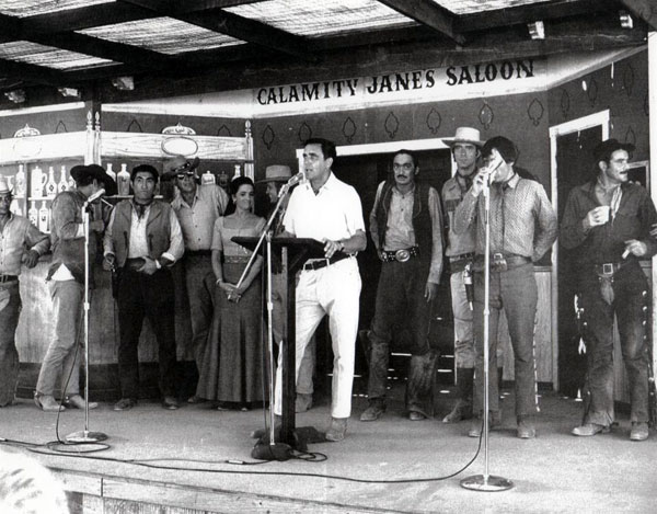 Bob Shelton, founder of Old Tucson where “High Chaparral” was filmed, introduces the cast of the series after a hot day of filming. (L-R) Jerry Summers, Don Collier, Rodolfo Acosta, Leif Erickson, Linda Cristal, Mark Slade, Shelton, Roberto Contreras, Ted Markland, Henry Darrow, Bobby Hoy. (Courtesy “High Chaparral” website.)
