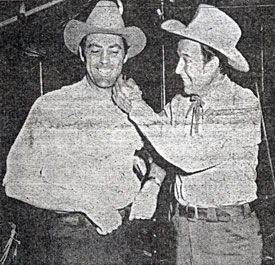 Bill Elliott seems to be chiding Allan “Rocky” Lane about his five o’clock shadow. Lane was visiting Elliott on the set of “The Last Bandit” (‘49).