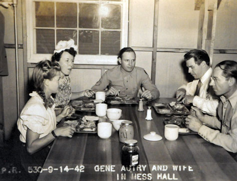 Gene’s wife Ina has dinner with Gene and others in the mess hall. September 14, 1942. (Thanx to Dave Straub.)