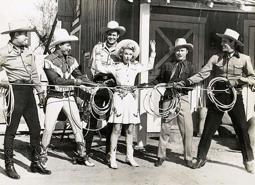 Having a little fun during the filming of Republic’s “Bells of Rosarita” (‘45) are (L-R) Bob Livingston, Roy Rogers, Sunset Carson, Dale Evans, Don Barry and Allan Lane. (Thanx to Jerry Whittington.)