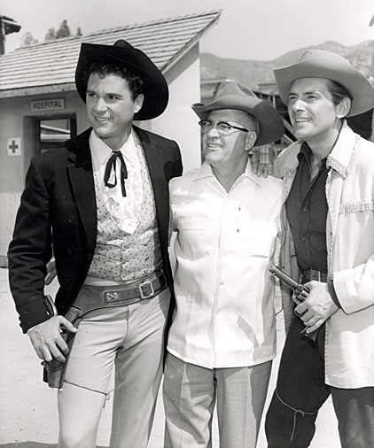 Robert Colbert and Jack Kelly who starred on Warner Bros.’ “Maverick” pose with Colbert’s father when he visited the Warner Bros. backlot.