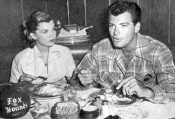 Before heading for some target practice fun at Ocean Park Pier (below) in early 1951, “U. S. Marshal” John Bromfield and his wife at the time Corinne Calvet stop for lunch at the popular Fox and Hounds restaurant.