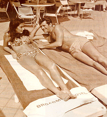 Hugh O’Brian and friend relax poolside at the Broadmoor Hotel in Colorado Springs, CO, in the early ‘60s.