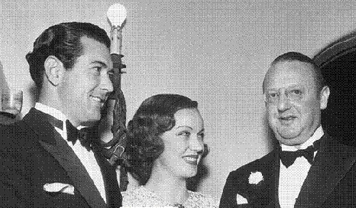 Johnny Mack Brown, Fay Wray and Jesse Lasky at a Gary Cooper home party.
