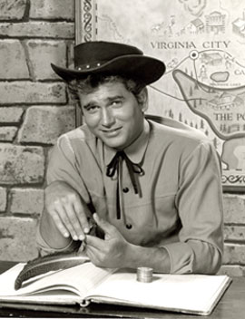 Michael Landon poses in front of the “Bonanza” map. (Thanx to Neil Summers.)
