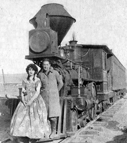 Madge Bellamy and George O’Brien on location for “The Iron Horse” in 1924, directed by John Ford.