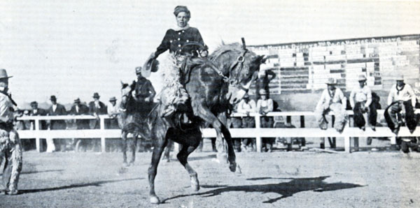 An early day photo of Hoot Gibson making a rodeo ride on Sky Rocket.
