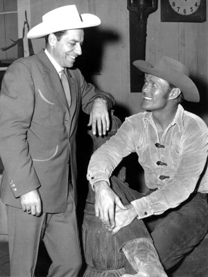 “The Rifleman”, Chuck Connors talks with ??? Does anyone know who the gentleman might be? (Thanx to Doug Abbott.)