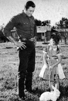 Clint Walker and daughter Valerie Jean and her pet rabbit. Circa March ‘58.