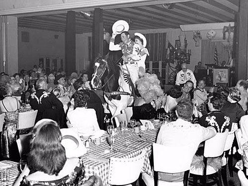 Montie Montana on his horse Rex treats a guest to a ride into the Palm Springs El Mirador dining room in the mid-‘50s. 