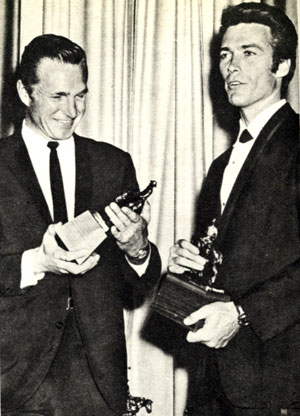 In civvies, Eric Fleming and Clint Eastwood...otherwise Gil Favor and Rowdy Yates on “Rawhide”, receive one of the many awards they’ve won. Photo circa 1964.
