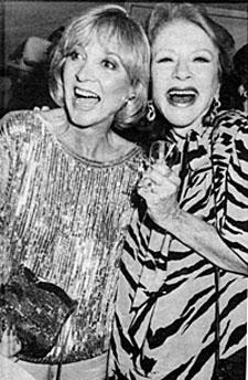 Beverly Garland and Amanda Blake enjoy a good laugh at the Golden Boot Awards reunion in 1966.