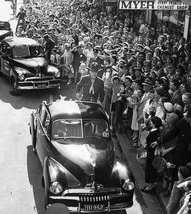 William Boyd—Hopalong Cassidy—is surrounded by fans while visiting Melbourne, Australia in 1954.