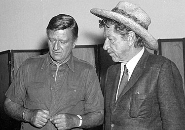 A quiet moment with John Wayne and Richard Boone.