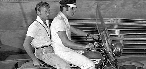 “The Rebel”, Nick Adams, takes a little non-horseback ride with good friend Elvis Presley.