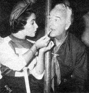 Not sure exactly what's going on in this photo, but I’m sure Hopalong Cassidy was happy to be doing anything with cute Elizabeth Taylor.