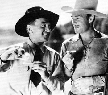 Harry Carey and Randolph Scott roll their own while making “Man of the Forest” in 1933.