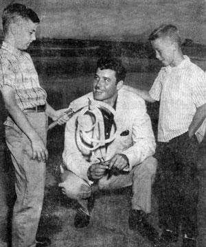 TV’s “Zorro”, Guy Williams, was in Albuquerque, New Mexico June 19-21, 1959 appearing at the Greater New Mexico Sports Show. Dennis Crosby (left) and Rusty Strong presented Williams with an authentic bullwhip.