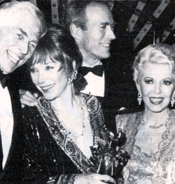 James Coburn with Shirley MacLaine, Clint Eastwood with Lana Turner during the Thalians Ball in October 1986 honoring Shirley as Ms. Wonderful.