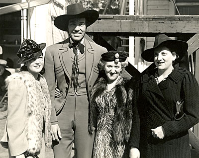 Cesar Romero as the Cisco Kid with three devoted fans in 1940. 