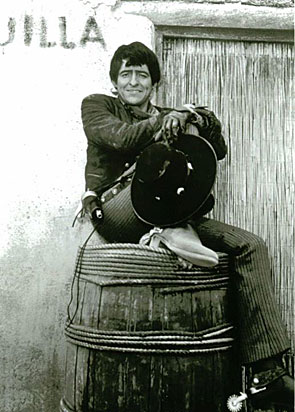 Manolito, Henry Darrow, relaxes on the set of “High Chaparral”. (Thanx to Ginny Shook.) 
