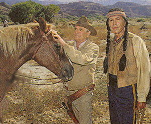 Glenn Ford and Michael Ansara take a break from filming the TV movie “Law at Randada” aka “Border Shootout” in 1990.