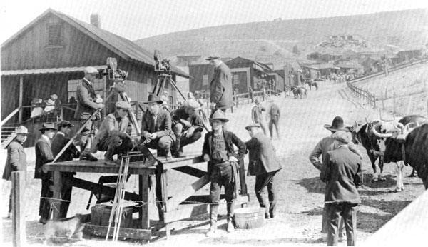 William S. Hart (standing center) and crew get ready to shoot another scene for
“Selfish Yates” (1918).