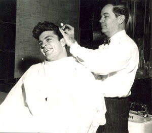 He had the most gorgeous head of hair in westerns! Dale Robertson gets a trim in Jackson, MS, during a personal appearance there. (Photo courtesy Danny Brown.)