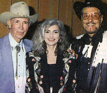 Eddie Dean, country singer Emmylou Harris and Herb Jeffries at an Autry Museum tribute to the singing cowboys in 1992.