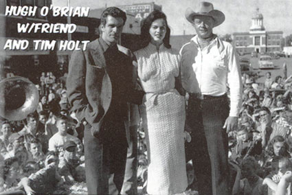 Hugh ‘Wyatt Earp” O‘Brian and Tim Holt make a personal appearance in Sayre, OK, in the ‘50s. The girl was apparently a local beauty queen. (Photo courtesy John Stovall from the Shortgrass Country Museum ‘09 calendar in Sayre.)