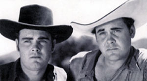 Sunset Carson (R) and his brother Dale who appeared with Sunset in several of Sunset's lowbudget Yucca Pictures in 1948.