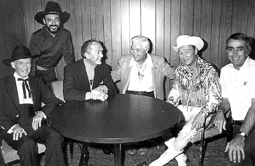 (L-R) Tim McCoy, music producer and former owner of Nostalgia Merchant Snuff Garrett, Kirk Alyn, Monte Hale, Roy Rogers and Tom Snyder backstage during the taping of Snyder's late night "Tomorrow" talk show on NBC on November 28, 1977.