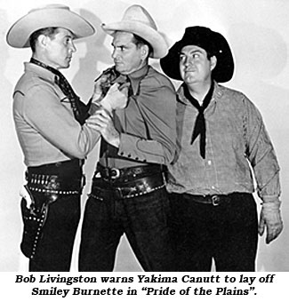 Bob Livingston warns Yakima Canutt to lay off Smiley Burnette in "Pride of the Plains".
