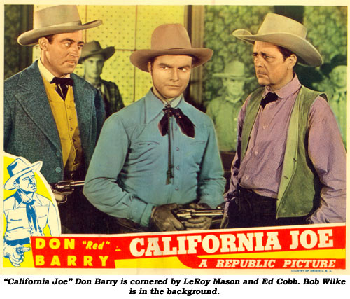 "California Joe" Don Barry is cornered by LeRoy Mason and Ed Cobb. Bob Wilke is in the background.