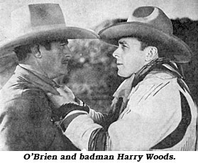 O'Brien with badman Harry Woods in "When a Man's a Man".