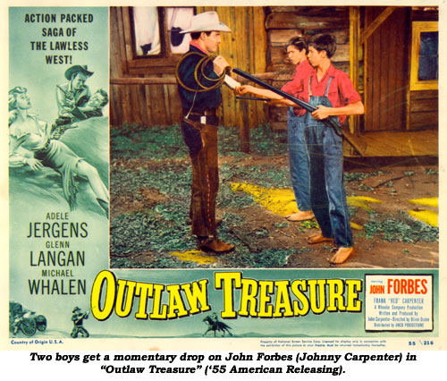 Two boys get a momentary drop on John Forbes (Johnny Carpenter) in "Outlaw Treasure" ('55 American Releasing).