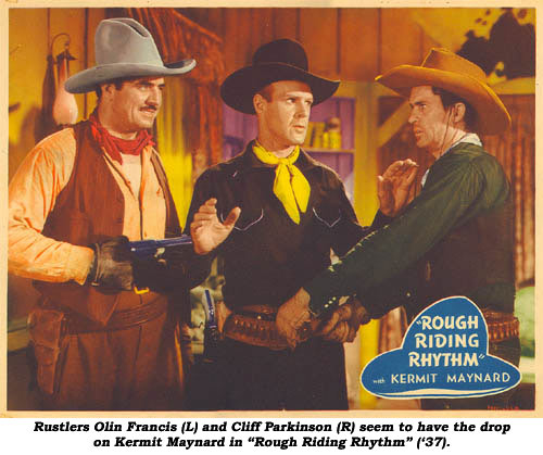 Rustlers Olin Francis (L) and Cliff Parkinson (R) seem to have the drop on Kermit Maynard in "Rough Riding Rhythm" ('37).
