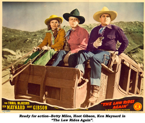 Ready for action--Betty Miles, Hoot Gibson, Ken Maynard in "The Law Rides Again".