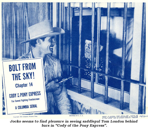 Jocko seems to find pleasure in seeing saddlepal Tom London behind bars in "Cody of the Pony Express lobby card from Chapter 14.